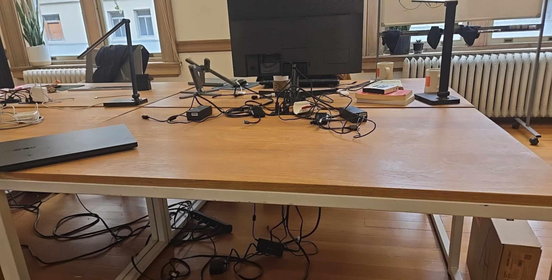 First office desk setup at Joe Coffee headquarters